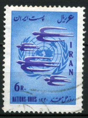 Colnect-1786-536-Swallows-in-flight-over-the-United-Nations-emblem.jpg