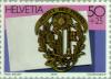 Colnect-141-040-Brass-shield-of-a-conductur-of-the-Geneva-Canton-Post--1849.jpg