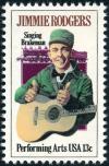 Colnect-4845-793-Jimmie-Rodgers-with-Guitar-and-Brakesman--s-Cap-Locomotive.jpg