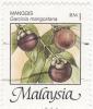 Colnect-975-449-Tropical-Fruits--Garcinia-mangostana.jpg