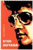Colnect-4946-454-Elvis-with-sunglasses-and-red-background.jpg
