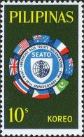 Colnect-2112-509-Flags-surrounding-SEATO-emblem.jpg