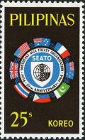 Colnect-2112-510-Flags-surrounding-SEATO-emblem.jpg