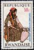 Colnect-2083-786-Woman-water-carrier-Tunisia.jpg