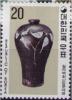 Colnect-2739-560-Black-Koryo-ware-vase-with-plum-blossom.jpg