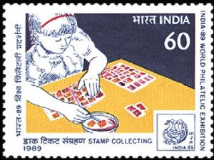 Colnect-2526-526-Girl-with-Stamp-Collection.jpg
