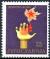 Colnect-1540-515-Flame-with-star-over-a-hand.jpg