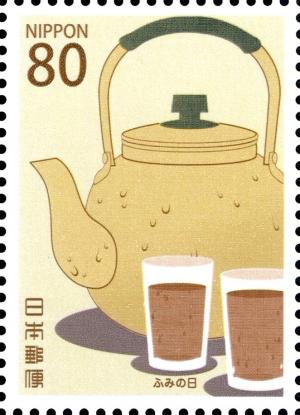 Colnect-3048-839-A-kettle-and-two-glasses-of-cold-barley-tea.jpg