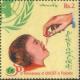 Colnect-2145-052-Young-boy-receiving-oral-vaccine.jpg