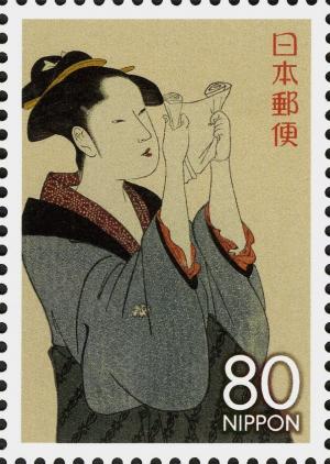 Colnect-4129-007--Woman-Reading-a-Letter--by-Kitagawa-Utamaro.jpg