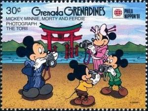 Colnect-4331-170-Mickey-Minnie-Morty-and-Ferdie-photographing-the-Torii.jpg