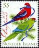 Colnect-3790-934-Crimson-Rosella-and-Green-Parrot-on-fir-branch.jpg