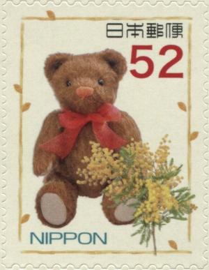Colnect-3046-552-Brown-Bear-and-Mimosoideae.jpg