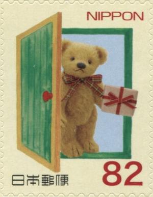 Colnect-3046-567-Gold-Bear-by-Green-Door.jpg