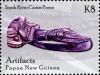 Colnect-2553-243-Sepik-River-canoe-prow-painted-purple.jpg