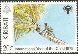 Colnect-1095-303-Boy-Climbing-Palm-Tree.jpg