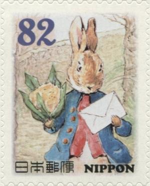 Colnect-3046-976-Rabbit-Holding-Letter-Cauliflower-Peter-Rabbit-Characters.jpg