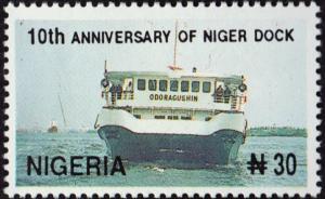 Colnect-5203-967-Niger-Dock---Boat-on-water.jpg