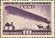 Colnect-931-045-Airship-over-factory-camel-and-reindeer.jpg