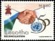 Colnect-3750-890-UN-emblem-and-handshake-of-reconciliation.jpg