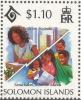 Colnect-5200-697-Girl-writing-letter-in-Brisbane-and-family-reading-it.jpg