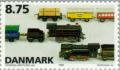 Colnect-157-381-Toy-tin-plate-locomotives---rolling-stock.jpg