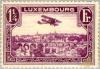 Colnect-133-508-Biplane-over-Luxembourg-City.jpg