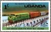 Colnect-4010-672-Goods-Train-on-the-Nile-Bridge-Uganda.jpg