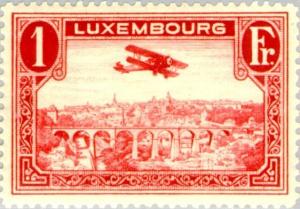 Colnect-133-507-Biplane-over-Luxembourg-City.jpg