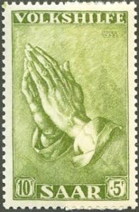 Colnect-438-302-Praying-hands.jpg