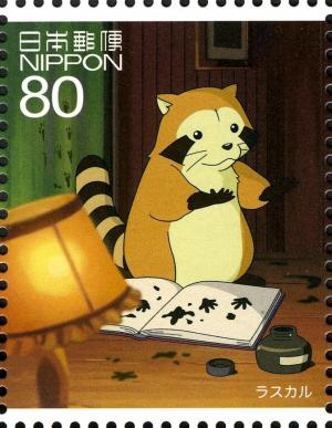 Colnect-3711-309-Rascal-the-Racoon-with-Book-and-Lamp.jpg