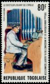 Colnect-5561-175-Dr-Albert-Schweitzer-Playing-Organ.jpg
