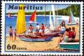 Colnect-2827-789-Beach-scene-with-sailboats.jpg