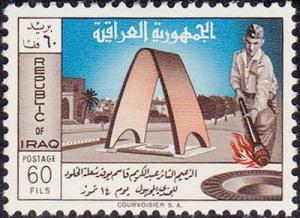 Colnect-1997-924-Grave-of-the-unknown-soldier-president-Kassem-with-torch.jpg