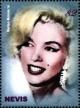 Colnect-5162-554-Marilyn-Monroe-smiling-wearing-drop-earrings.jpg