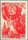 Colnect-192-898-Women-marching-under-flag-of-Lenin---Stalin.jpg