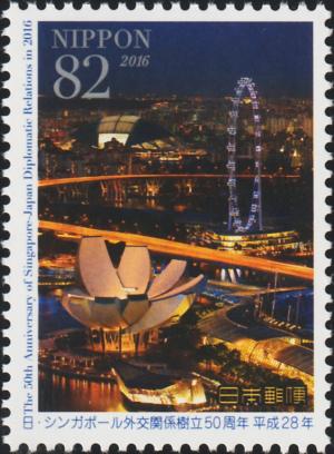 Colnect-5941-771-Singapore-Flyer-Ferris-Wheel-and-ArtScience-Museum-at-Night.jpg