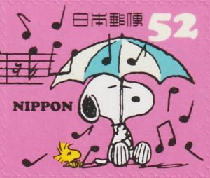Colnect-6262-785-Snoopy-and-Woodstock-under-Umbrella.jpg