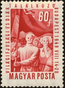 Colnect-4404-970-Soviet-youths-carrying-flags.jpg