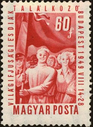 Colnect-4404-970-Soviet-youths-carrying-flags.jpg