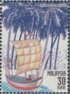 Colnect-1434-246-New-Millennium--Sailing-boat-and-palm-trees.jpg