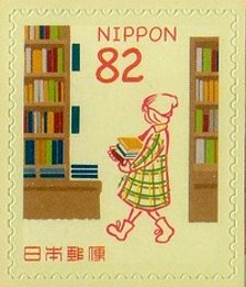 Colnect-4301-526-Girl-with-Books.jpg
