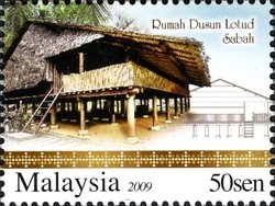 Colnect-1435-740-Dusun-Lotud-Traditional-House.jpg