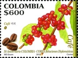 Colnect-1700-864-Coffee-ripe-and-toasted-beans.jpg