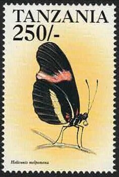 Colnect-5970-179-The-postman-butterfly-Heliconius-melpomene.jpg