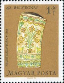 Colnect-667-217-42nd-Stamp-Day---Jar-with-flower-decoration.jpg