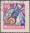 Colnect-2336-093-Snail-and-money-bag.jpg