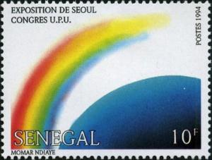 Colnect-2189-077-Rainbow-and-Globe.jpg