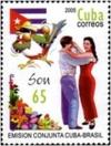 Colnect-2526-909-Son-dancers-and-Cuban-flag.jpg