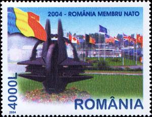 Colnect-5375-325-NATO-Monument-Romanian-Flag-Brussels-Headquarters.jpg